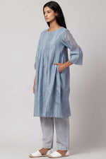 Load image into Gallery viewer, Blue hand-embroidered dress made in 100% handwoven yarn dyed silk Chanderi - side
