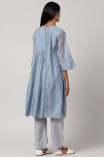 Load image into Gallery viewer, Blue hand-embroidered dress made in 100% handwoven yarn dyed silk Chanderi - back

