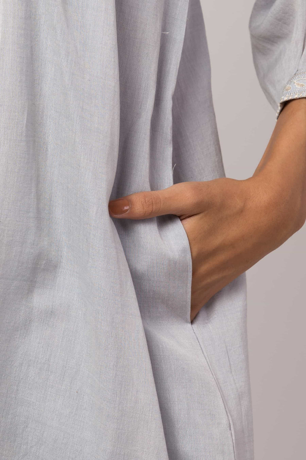 Baby blue Chikankari tunic made in 100% handwoven yarn dyed cotton Chanderi - pocket